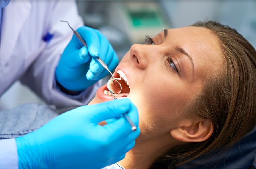 woman in 30's receiving dental crowns at best dentist in san mateo